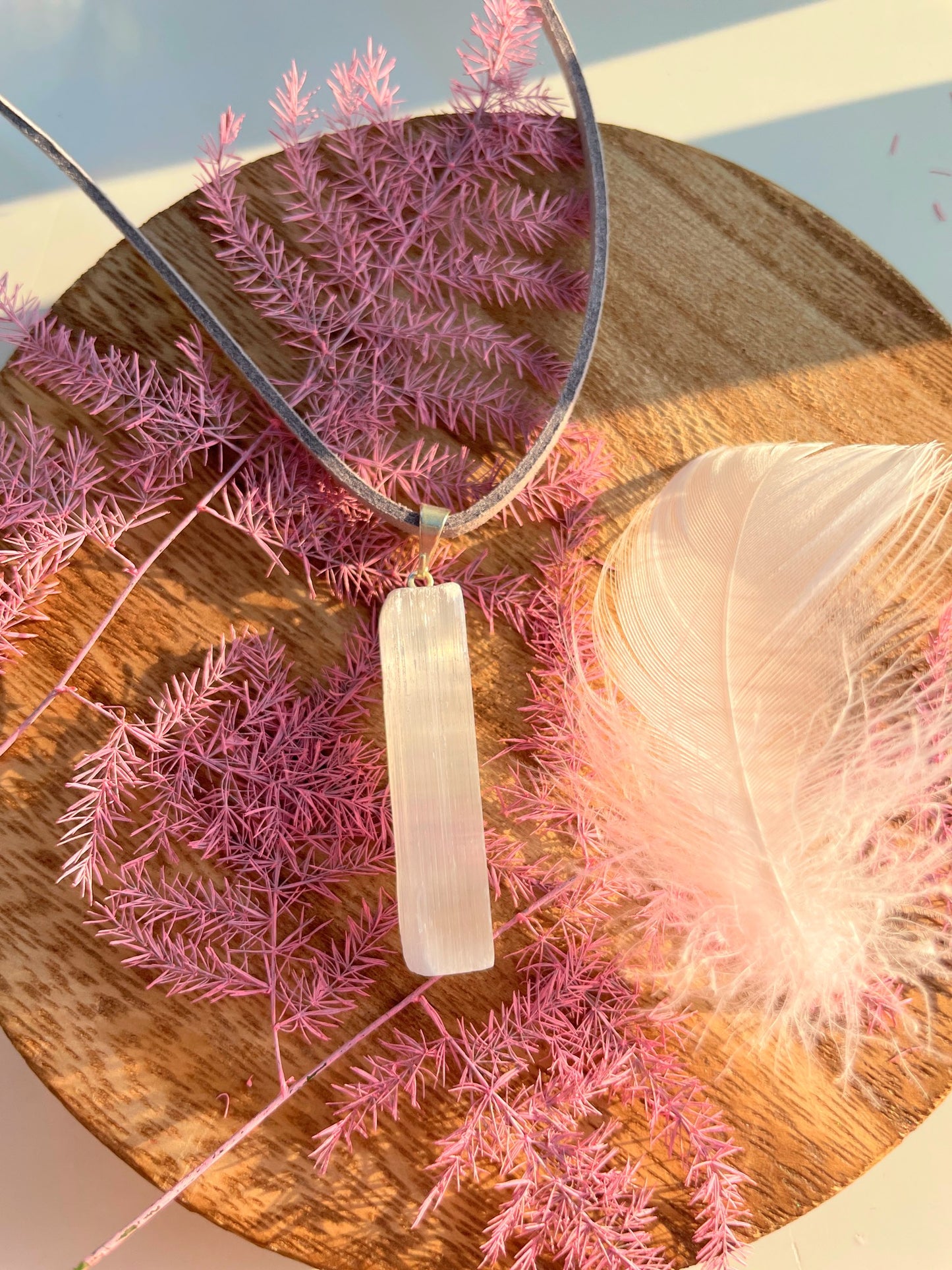 Selenite pendant on vegan suede ðĪ