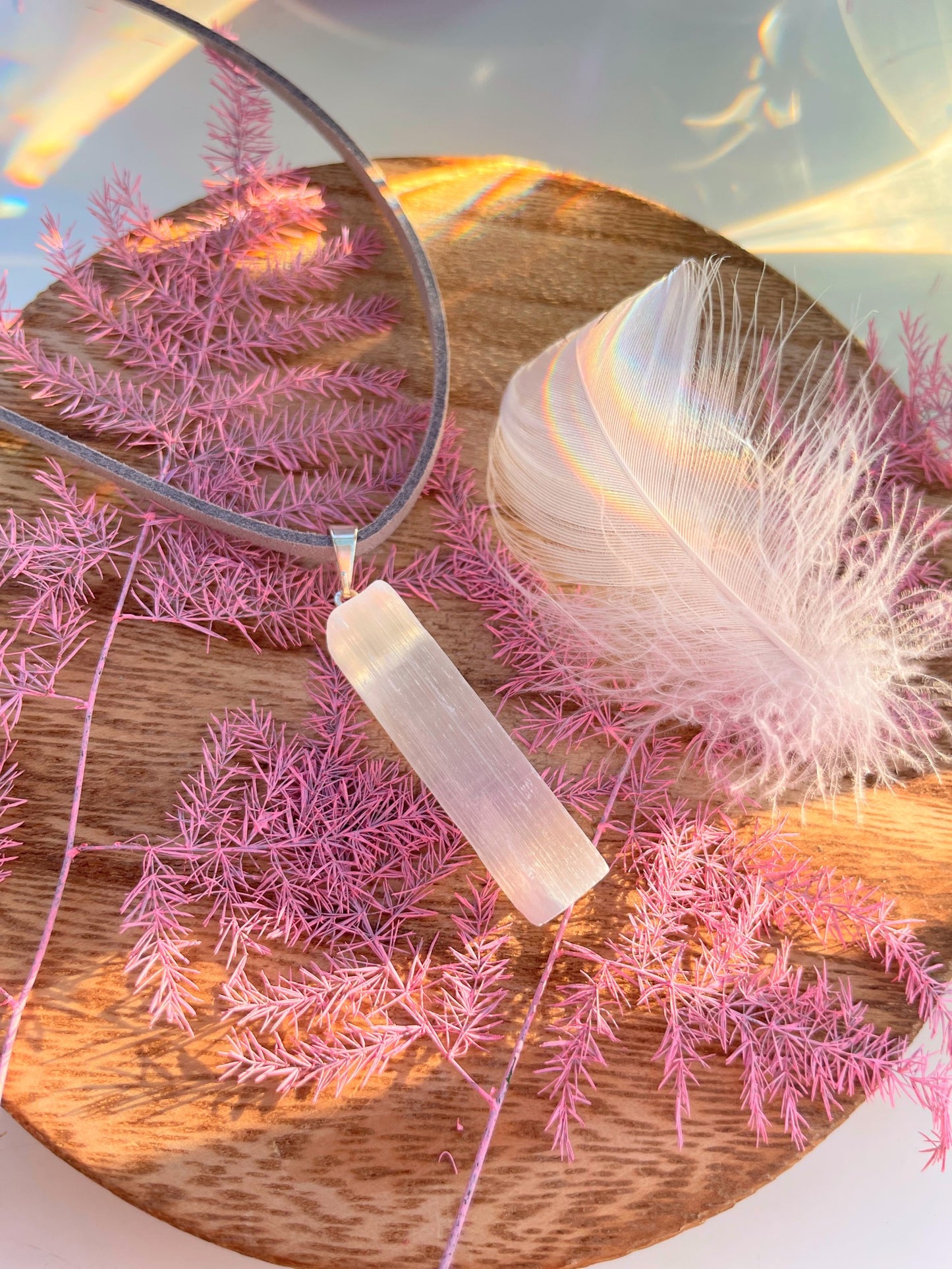 Selenite pendant on vegan suede ðĪ